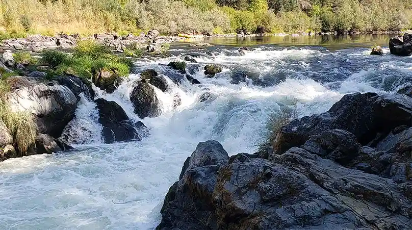 River with many boulders and whitewater